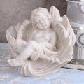 śpiacy aniołek figura w stylu barokowym