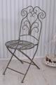 metalowe krzesło ogrodowe z fantazyjnym oparciem