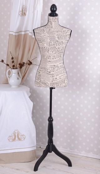 stylowy manekin krawiecki z czarną nogą