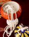 porcelanowa bombonierka z figurą tancerki w stylu art deco