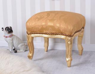 złoty stołek podnóżek w stylu barokowym